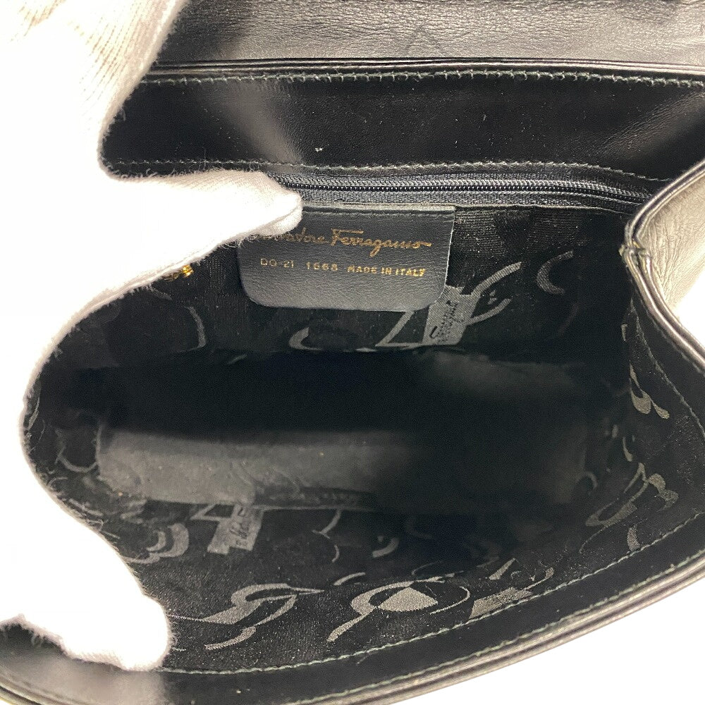 Interior of a Salvatore Ferragamo vintage bag featuring a sleek black lining and logo detailing