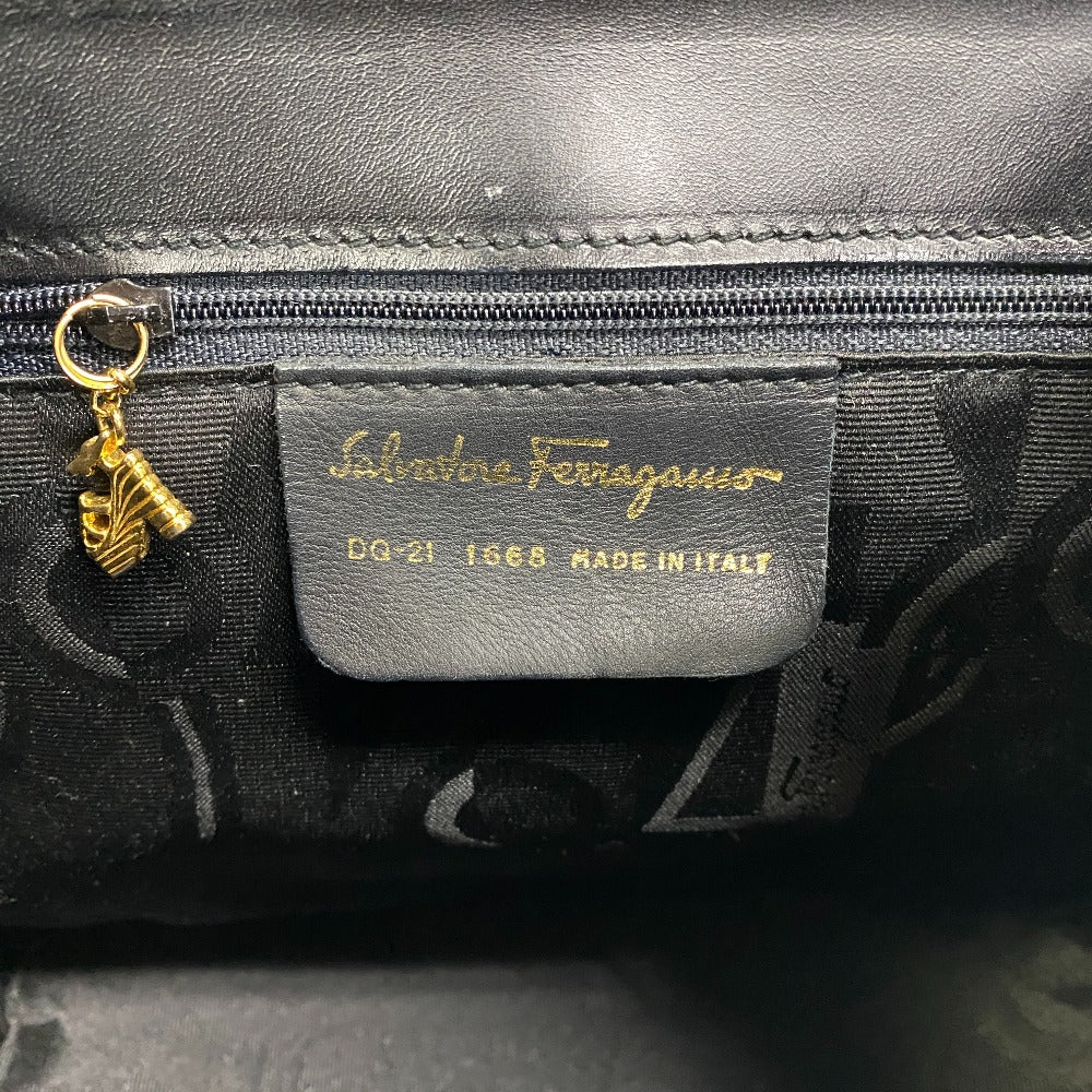 Interior view of a vintage Salvatore Ferragamo bag showing the brand label and zipper detail