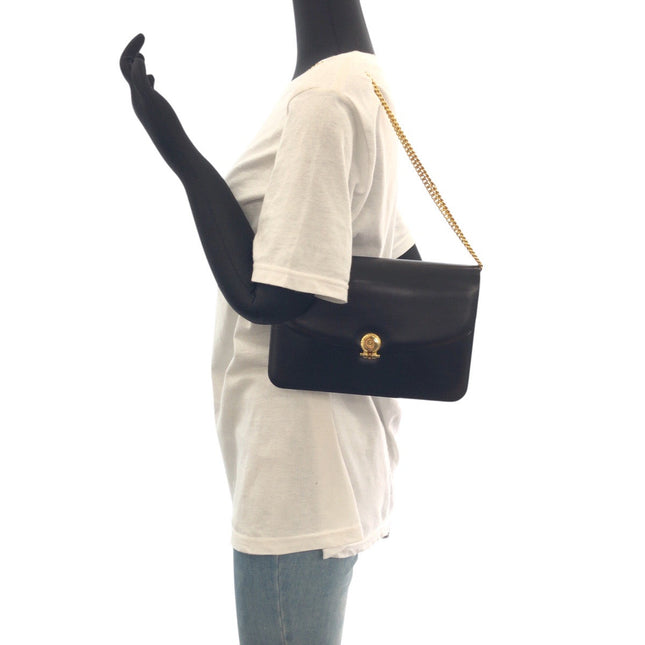 Christian Dior vintage black handbag with a chain strap and gold clasp for stylish everyday use