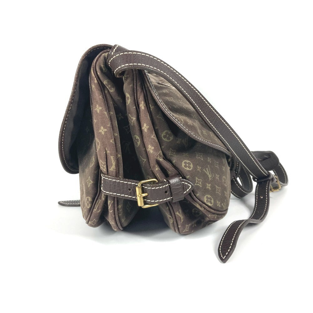 Vintage Louis Vuitton shoulder bag featuring classic monogram design and adjustable strap