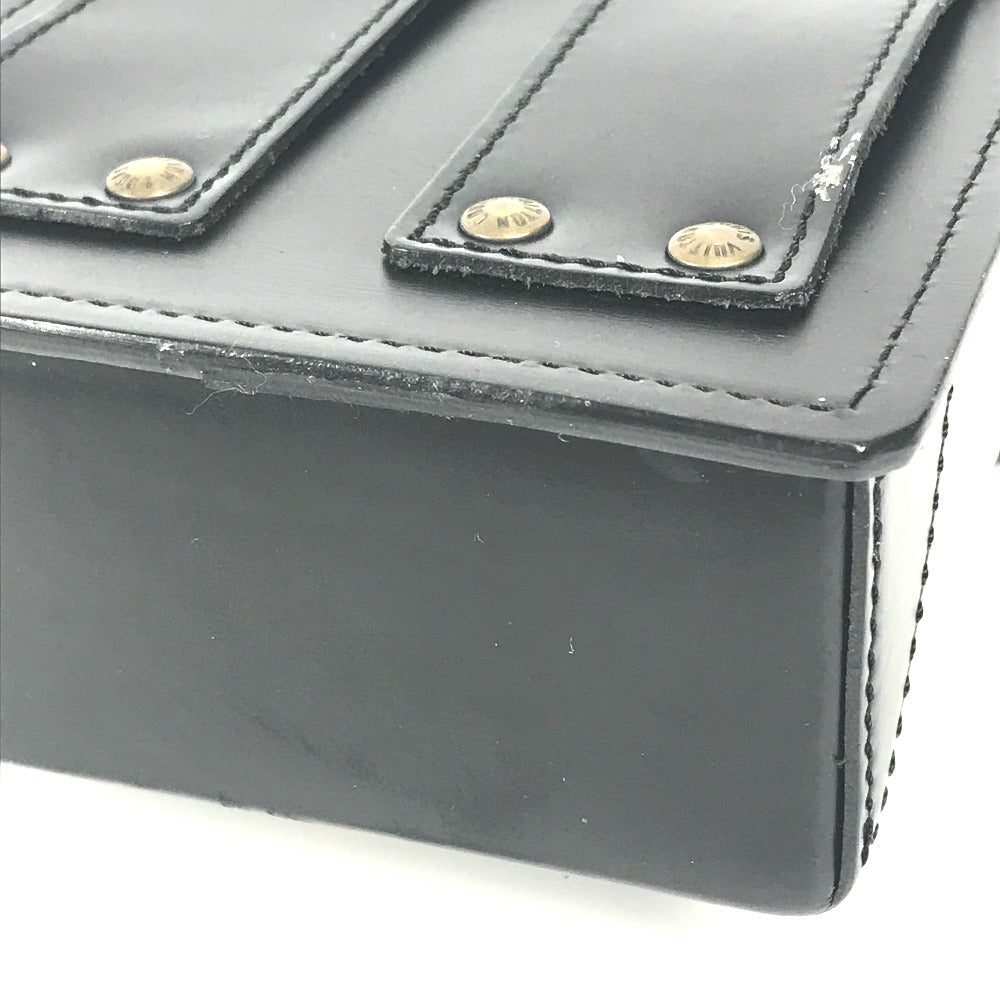 Close-up of LOUIS VUITTON Vintage Pouch showcasing textured black leather and gold hardware detail