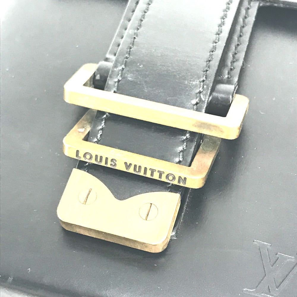 Close-up of LOUIS VUITTON Vintage Pouch featuring a gold buckle and premium leather detailing