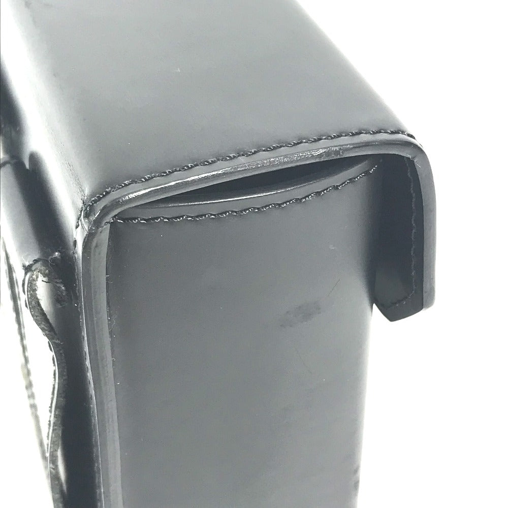 Close-up of a Louis Vuitton Vintage Pouch showcasing sleek black leather and precise stitching